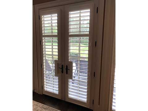 Double door with shutters